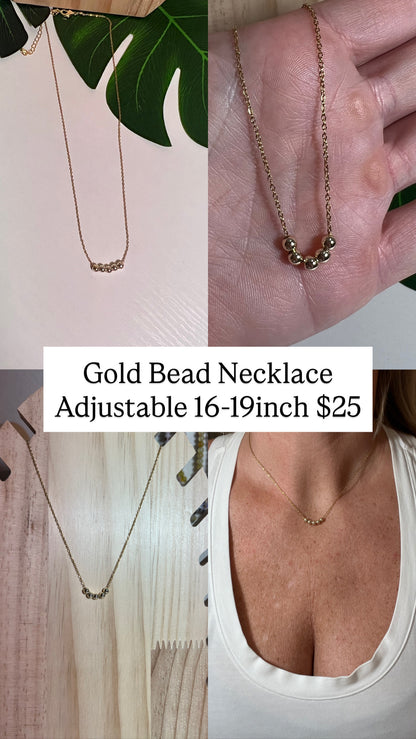 Gold Bead Laying Necklace