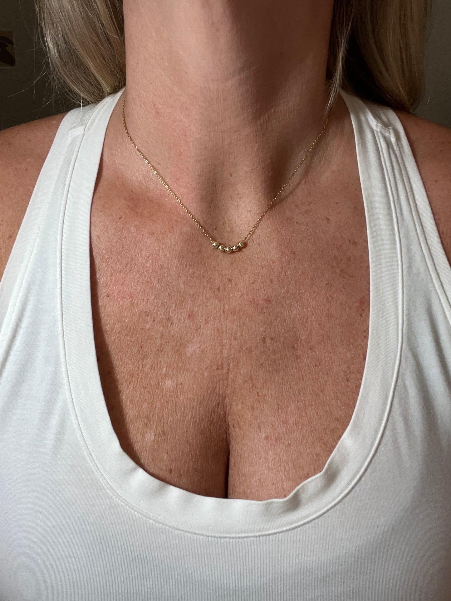 Gold Bead Laying Necklace