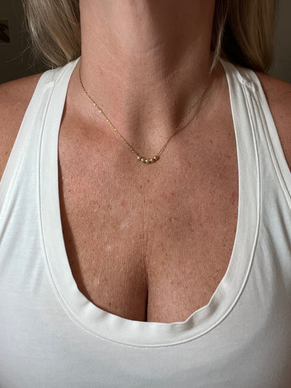 Gold Bead Laying Necklace