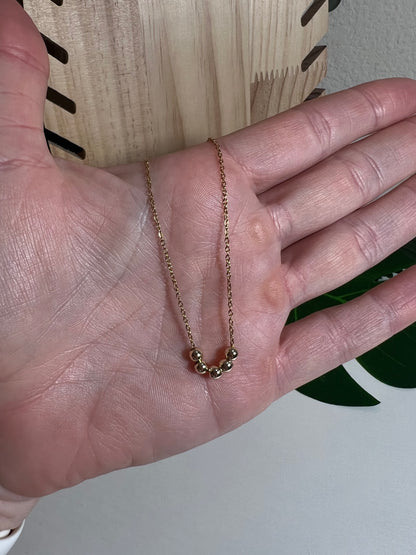 Gold Bead Laying Necklace