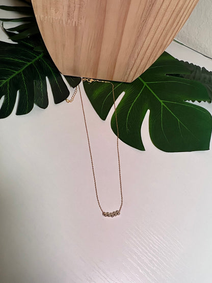 Gold Bead Laying Necklace