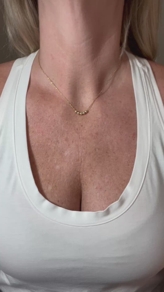 Gold Bead Laying Necklace